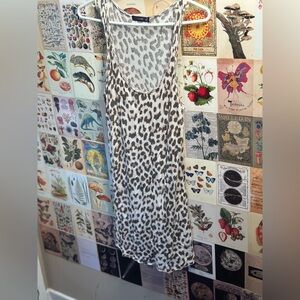 Dex size large cheetah print tank top. Long fitting. Good condition.